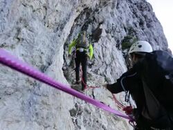 Men rock climbing in the mountains. - 1920x1080 Stock Footage