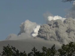 Steam and ash pour from Kirishima volcano Shinmoe crater / AUDIO Stock Footage