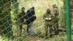 CLEAN : Soldiers police take part in Brussels anti terror raid News Clip