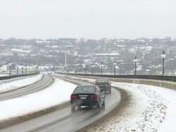 MS PAN Cars passing over wintery 40 MPH bridge/ Saint Paul, Minnesota, United States  Stock Footage