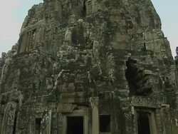 Tilt Up Shot Bay on Temple Tower Angkor Thom Siem Reap Cambodia Stock Footage