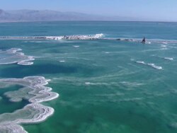 Aerial Dead Sea salt formations, low ride towards north, Israel , southern Judea Desert Stock Footage