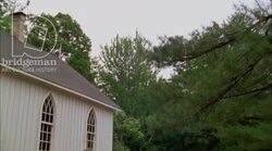 People outside a town church hall, 1908 - reenactment Stock Footage