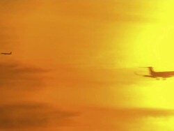 Planes Flying At Sunset News Clip