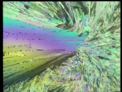 Rotate and zoom in to colourful crystal, fan like crystal shards Stock Footage