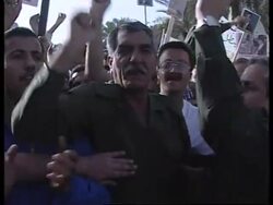 Ten thousand join demo to back Saddam oil policy News Clip