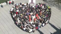 CLEAN : Greenpeace activists form giant heart News Clip