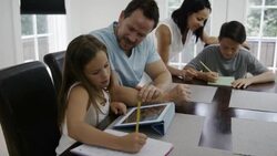 Family Helping with Homework Stock Footage