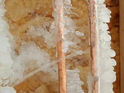 Frozen Cracked Copper Water Pipe Leaking into House Basement Stock Footage