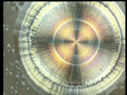 Rotate and zoom in to colourful crystals, concentric circle pattern Stock Footage