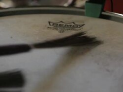 C/U drummer playing, brushed drumsticks Stock Footage