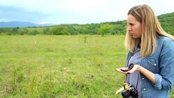 Female hiker taking a rest from walking Stock Footage