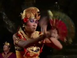 MS Balinese dancer is performing Kebyar Terompong Dance in front of Gamelan orchestra in Puri Saraswati temple AUDIO / Ubud, Bali, Indonesia, Asia Stock Footage