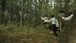 HD Super Slow-Mo: Paintball Team Attacking The Enemy Stock Footage