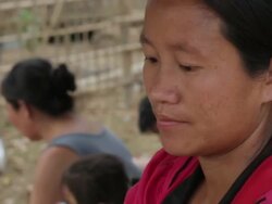 CU TU Woman work on sugarcane pressing machine / Vang Vieng, Vientiane, Laos  Stock Footage