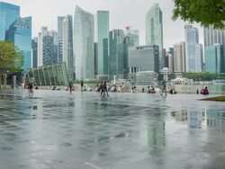 Crowd of anonymous people walking on busy Singapore city Stock Footage