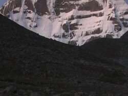 Tilt Up North Face Mount Kailash and its sunlit crown Lhasa Tibet China Stock Footage
