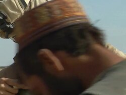 CU Soldiers talking to civilian / Musa Qala, Helmand Province, Afghanistan.  Stock Footage