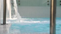 Swimming pool spa water fall Stock Footage
