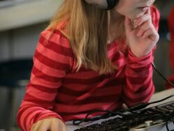 CU TU Student wearing headphones sitting in computer lab / Richmond, Virginia, United States  Stock Footage