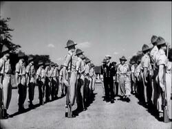 DUKE VISITS TROOPS BY HELICOPTER News Clip