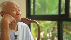 close-up portrait of a asian senior man thinking about something Stock Footage