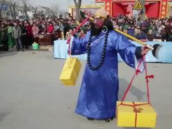 MS TS Villagers dressed as figures in chinese mythology pose attend parade during shehuo celebrations, Shehuo is traditional festive folk celebration during chinese spring festival AUDIO / xi'an, shaanxi, china Stock Footage