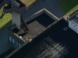 MS AERIAL ZI ZO DS Shot of Olympic Ski Jumps at Placid lake / New York, United States Stock Footage