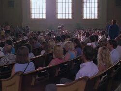 WS Pews of church filling with people and camera men set up for televised sermon / Manitoba ,Canada, United States Stock Footage