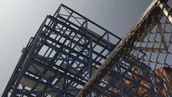 high rise building construction site in city in summer with sound Stock Footage