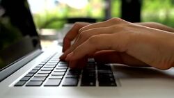Closeup On Woman's Hand Typing On A Laptop Keyboard Stock Footage