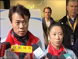 Lion dancers congratulate gold-medal winning Chinese figure skaters News Clip