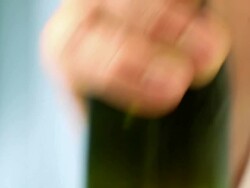 Man's hand opening beer with finger Stock Footage