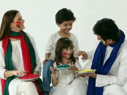 Family playing holi with colors  Stock Footage