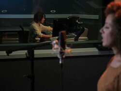 Female and technician in recording studio Stock Footage