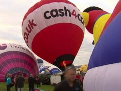 Hot air balloons inflated News Clip