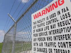 Secured area with fence and razor wire. Air traffic control. Stock Footage