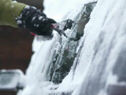 HD: Scraping Snow Off The Car Windows Stock Footage