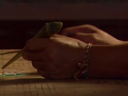 MS Yellow sand being poured from  funnel onto  outline sketche on wood  / Kathmandu, Central, Nepal Stock Footage