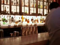 MS PAN Middle aged couple drinking together inside upscale bar having fun and smiling / Minneapolis, Minnesota, United States Stock Footage