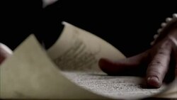 Nostradamus unrolls a piece of parchment. Stock Footage