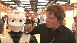 Service oriented robots made their debut at the Innorobo trade show in France. The robots can navigate large crowds and identify objects for human owners. (March 20) News Clip