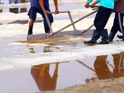 salt collecting in farm Stock Footage