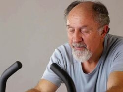 Man on Exercise Bike Stock Footage