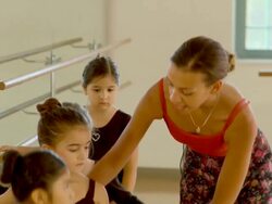 CU, PAN, TD, Four girls (6-7, 8-9) practicing ballet at bar in ballet class, Richmond, Virginia, USA Stock Footage