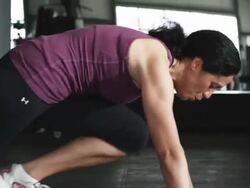 woman doing squats in a gym Stock Footage