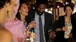 Multi-ethnic friends celebrating with champagne Stock Footage