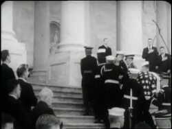 An honor guard carries the flag-draped coffin of U.S. President John F. Kennedy up the steps of the Capitol Building. News Clip
