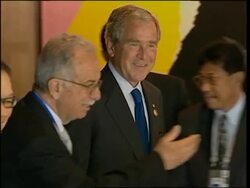 WRAP Arrivals, Bush, Howard on global warming ADDS reax News Clip