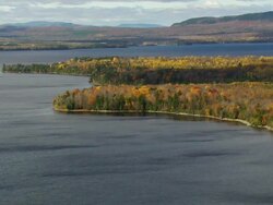 WS ARIEAL View of Wooded area and Moosehead lake / Maine, United States Stock Footage